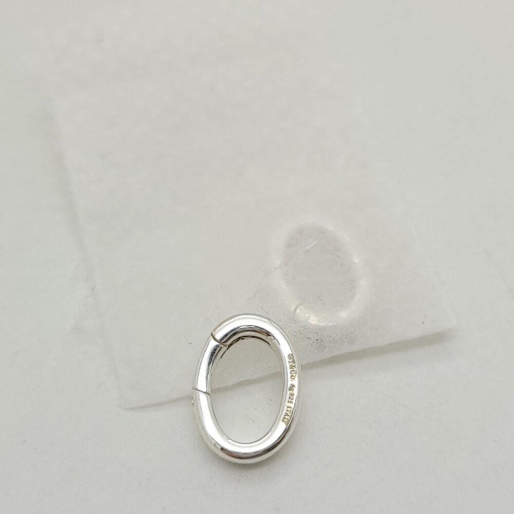 Tiffany & Co Sterling Silver Oval Clasping Link Spring Jump Ring Charm Pendant